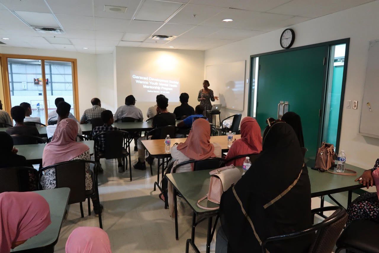 Community members collaborating at a Generational Development Society program