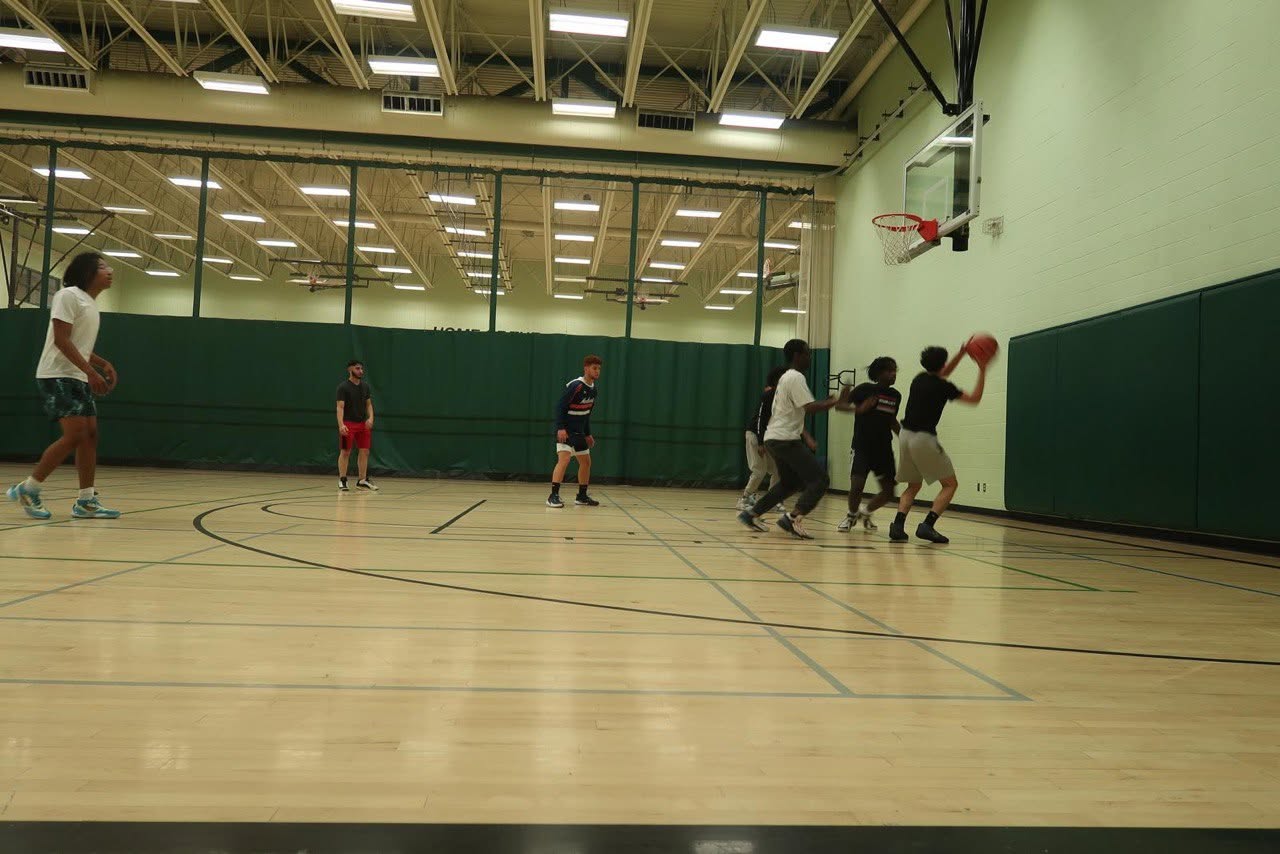 Youth playing games and socializing at the drop-in centre